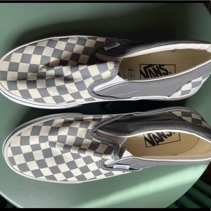 Gray checkerboard slip on vans
